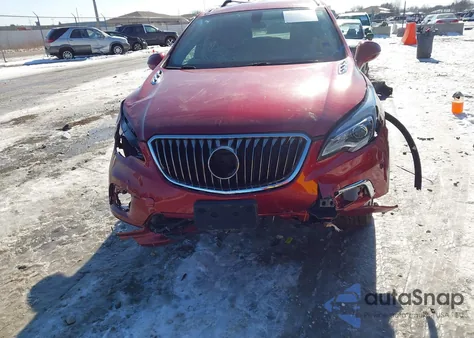 2017 Buick Envision Essence z USA, uszkodzony, nr VIN LRBFXDSA7HD123140